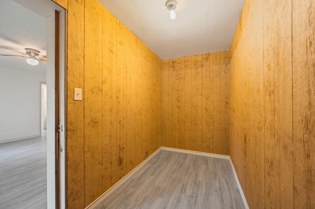 1823 Mandrill Ln, Houston, TX 77067 - interior space featuring light wood-style floors, baseboards, and wood walls