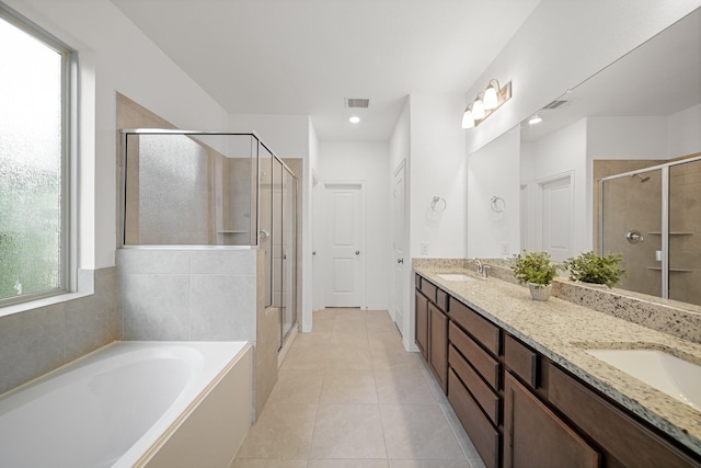 1706 Country Air Ln, Missouri City, TX 77459 - bathroom featuring a garden tub, visible vents, a sink, and a shower stall