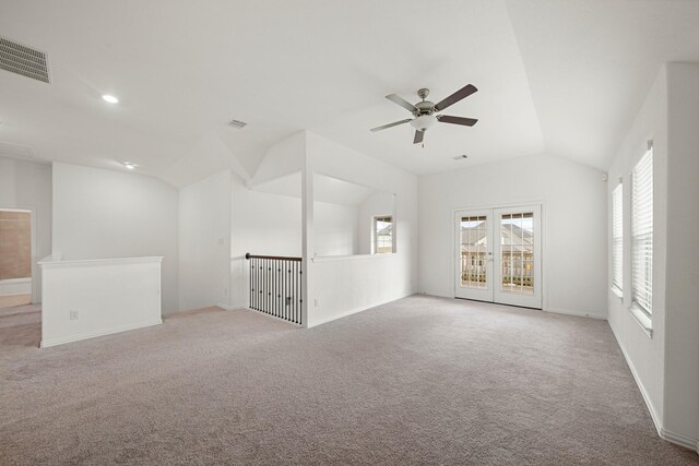 1706 Country Air Ln, Missouri City, TX 77459 - carpeted spare room with vaulted ceiling, a ceiling fan, visible vents, and baseboards