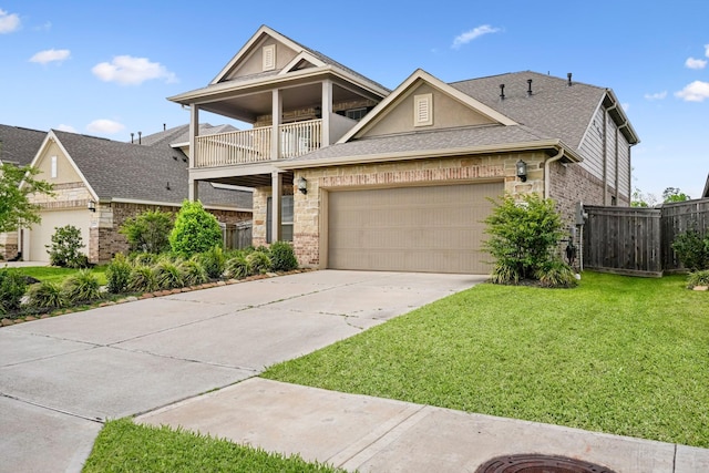1706 Country Air Ln, Missouri City, TX 77459 - view of front facade with driveway, fence, an attached garage, a balcony, and a front yard