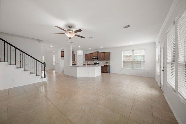 1706 Country Air Ln, Missouri City, TX 77459 - unfurnished living room with visible vents, recessed lighting, a ceiling fan, stairway, and light tile patterned floors