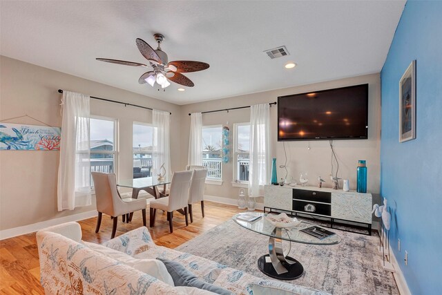 126 Driftwood, Freeport, TX 77541 - living room with a ceiling fan, baseboards, wood finished floors, and recessed lighting