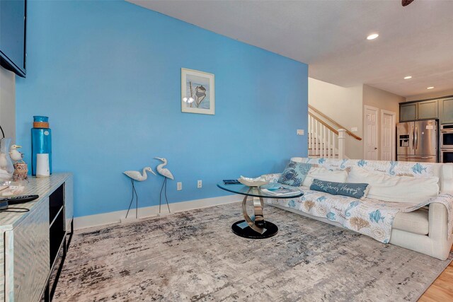 126 Driftwood, Freeport, TX 77541 - living room featuring wood finished floors, recessed lighting, stairway, and baseboards