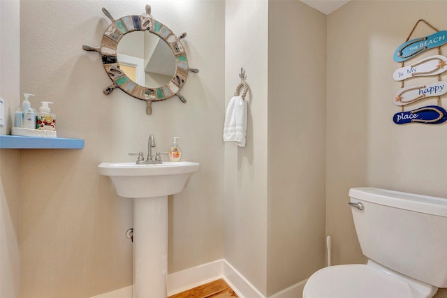 126 Driftwood, Freeport, TX 77541 - half bath with toilet and baseboards