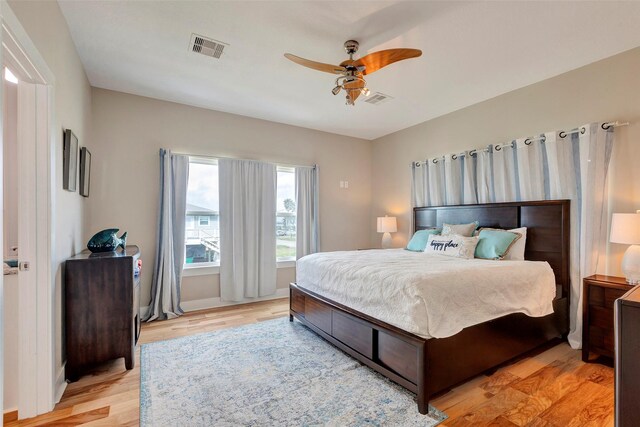 126 Driftwood, Freeport, TX 77541 - bedroom featuring light wood-style flooring, ceiling fan, and baseboards