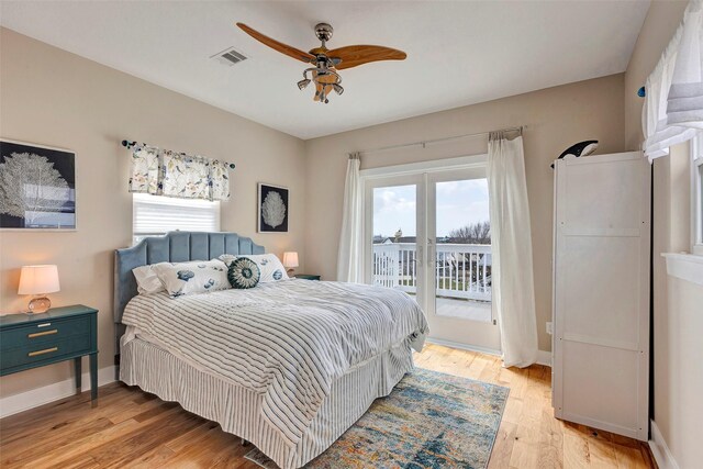 126 Driftwood, Freeport, TX 77541 - bedroom with access to exterior, multiple windows, light wood-type flooring, and ceiling fan