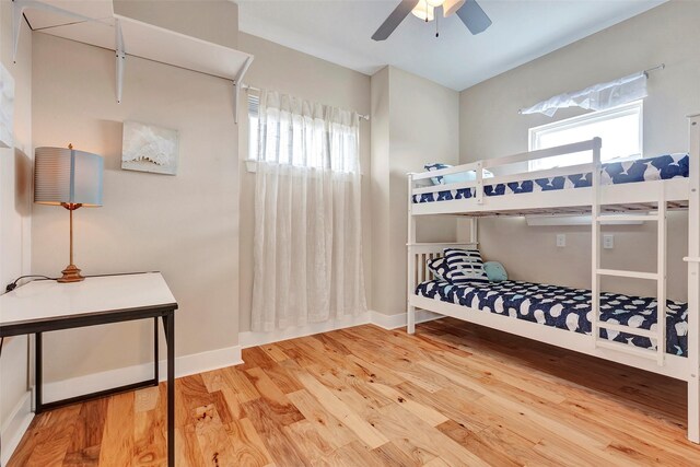 126 Driftwood, Freeport, TX 77541 - bedroom with wood finished floors, baseboards, and ceiling fan