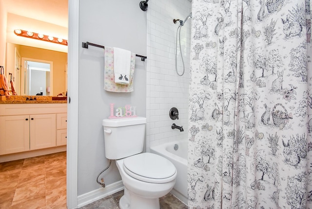 bathroom featuring baseboards, toilet, vanity, and shower / bath combo with shower curtain