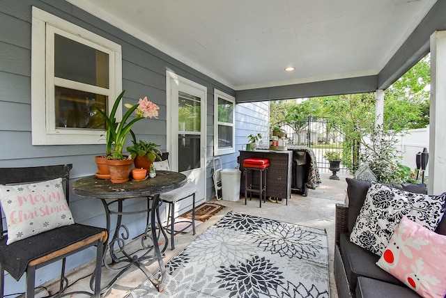 view of patio / terrace featuring fence