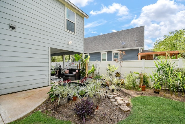 view of yard with fence and a patio area