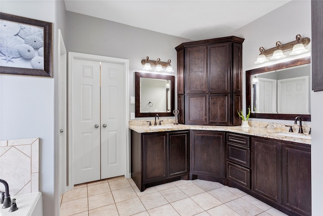 7410 Norwood Point Ct, Richmond, TX 77407 - full bath with tile patterned floors, double vanity, and a tub
