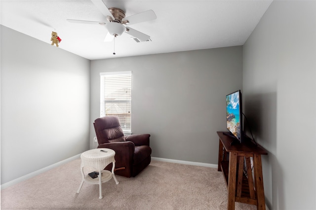 7410 Norwood Point Ct, Richmond, TX 77407 - living area featuring light colored carpet, ceiling fan, and baseboards