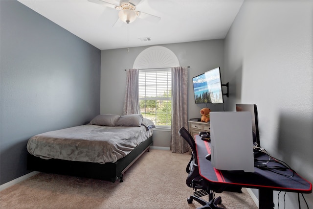 7410 Norwood Point Ct, Richmond, TX 77407 - bedroom featuring a desk, light colored carpet, baseboards, and ceiling fan