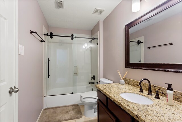 7410 Norwood Point Ct, Richmond, TX 77407 - full bath featuring toilet, tile patterned floors, vanity, and enclosed tub / shower combo