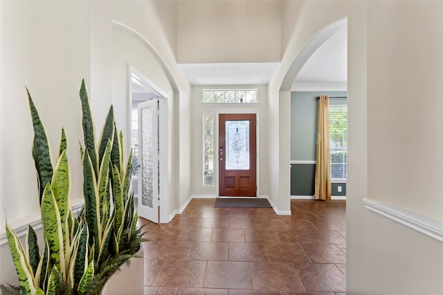 7410 Norwood Point Ct, Richmond, TX 77407 - foyer entrance with baseboards and arched walkways