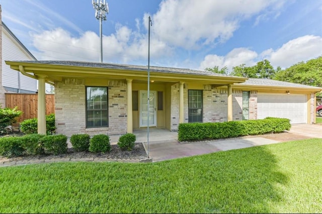 17707 Smooth Rock Falls Dr, Spring, TX 77379 - ranch-style home with brick siding, an attached garage, and driveway