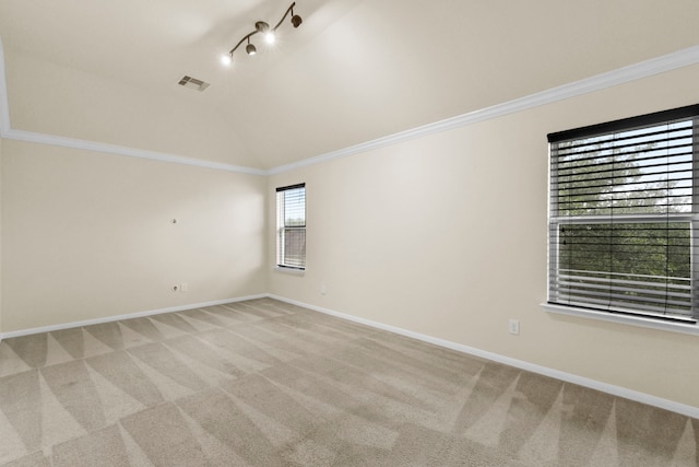 2830 Meadowbrook Ln, Rosenberg, TX 77471 - spare room featuring lofted ceiling, visible vents, baseboards, and light carpet