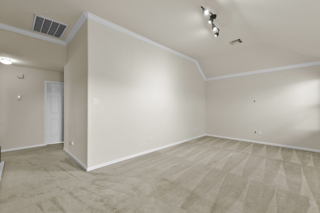 2830 Meadowbrook Ln, Rosenberg, TX 77471 - interior space featuring vaulted ceiling, visible vents, light carpet, ornamental molding, and baseboards