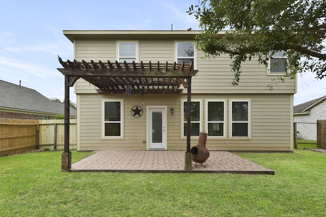 2830 Meadowbrook Ln, Rosenberg, TX 77471 - rear view of house with a pergola, a yard, a patio, and a fenced backyard