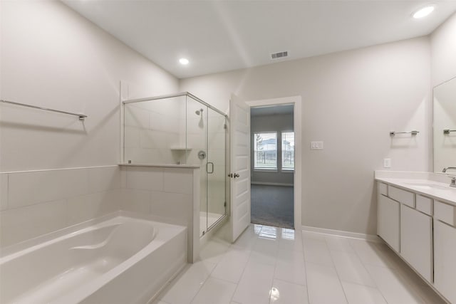 full bath with a garden tub, visible vents, a shower stall, vanity, and tile patterned floors