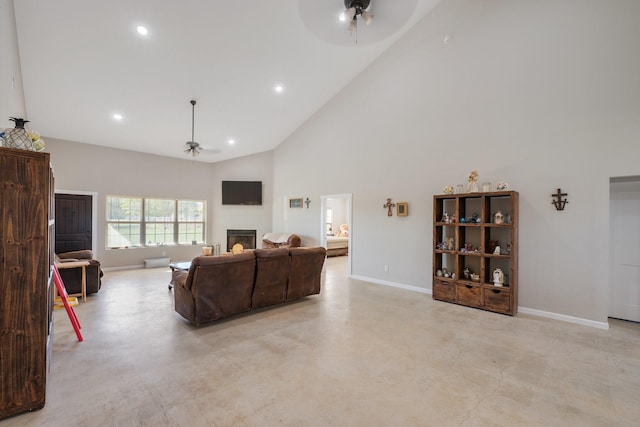 414 N Old Springfield Rd, North Zulch, TX 77872 - living room featuring baseboards, a ceiling fan, concrete flooring, and high vaulted ceiling