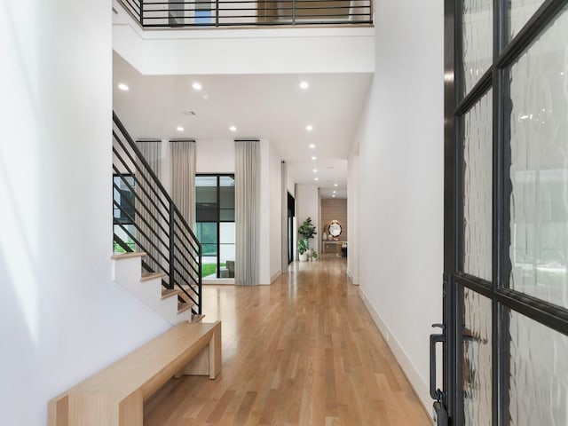 4024 Chatham, Houston, TX 77027 - entryway with wood finished floors, a high ceiling, recessed lighting, and stairs