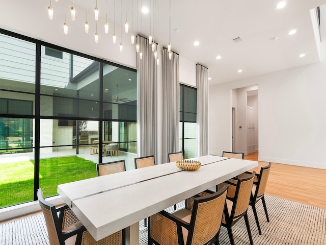 4024 Chatham, Houston, TX 77027 - dining room with baseboards, wood finished floors, and recessed lighting