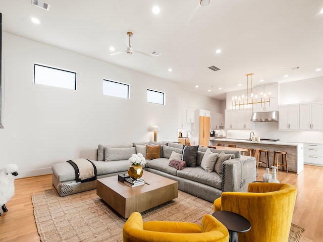 4024 Chatham, Houston, TX 77027 - living room with light wood-type flooring, visible vents, and recessed lighting