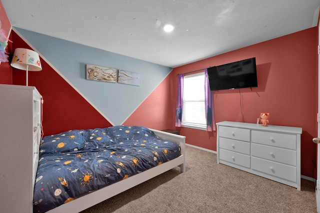 carpeted bedroom with baseboards