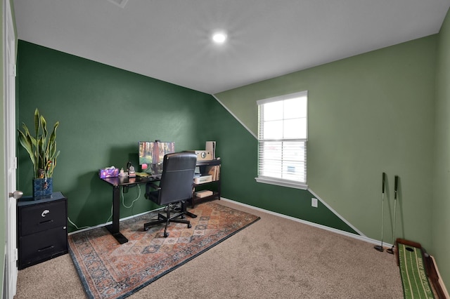 carpeted home office with baseboards