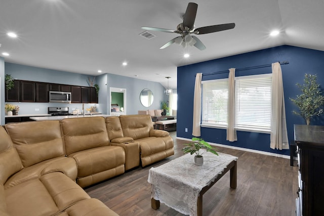 living area featuring ceiling fan, dark wood-style flooring, visible vents, and recessed lighting