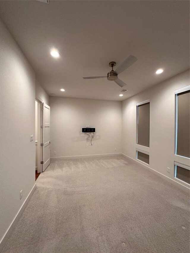 2409 Webster St, Houston, TX 77003 - carpeted empty room with recessed lighting and ceiling fan