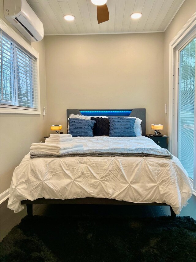 bedroom with recessed lighting, a wall mounted air conditioner, baseboards, and ceiling fan