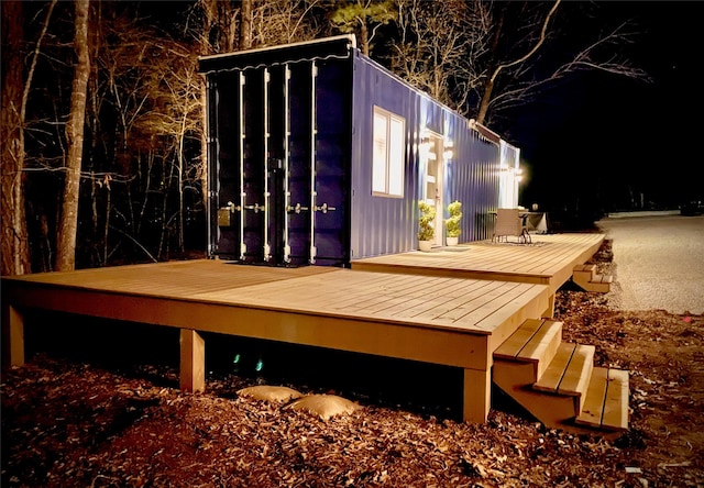 view of deck at night