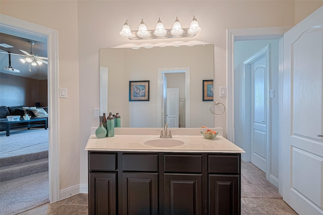 20322 Fossil Valley Ln, Cypress, TX 77433 - bathroom with ensuite bathroom, vanity, tile patterned flooring, and a ceiling fan