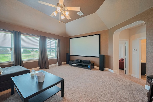 20322 Fossil Valley Ln, Cypress, TX 77433 - home theater featuring arched walkways, carpet, a ceiling fan, and vaulted ceiling
