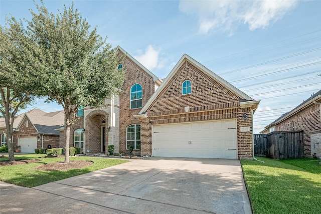 20322 Fossil Valley Ln, Cypress, TX 77433 - traditional-style house featuring brick siding, concrete driveway, and a garage