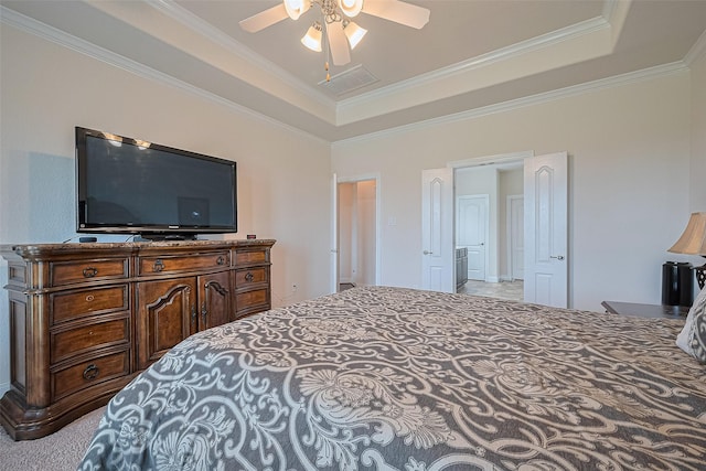 20322 Fossil Valley Ln, Cypress, TX 77433 - bedroom with a tray ceiling, ornamental molding, and a ceiling fan