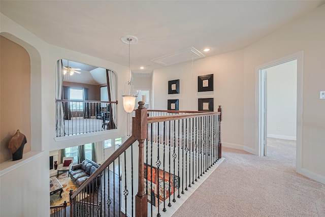 20322 Fossil Valley Ln, Cypress, TX 77433 - hallway with attic access, carpet floors, an upstairs landing, arched walkways, and recessed lighting