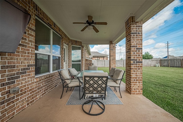 20322 Fossil Valley Ln, Cypress, TX 77433 - fenced backyard featuring outdoor dining area, a ceiling fan, and a patio area