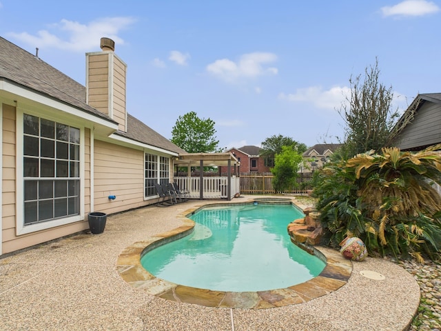 view of pool with a patio area, a fenced in pool, and a fenced backyard
