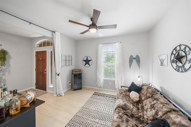 18203 Octavio Frias Trl, Atascocita, TX 77044 - living room featuring baseboards and ceiling fan