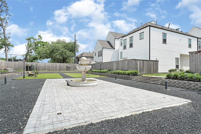 view of patio / terrace featuring fence