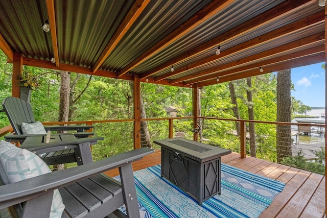 deck featuring a water view