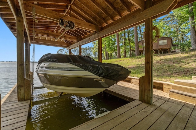 dock area featuring a water view and boat lift