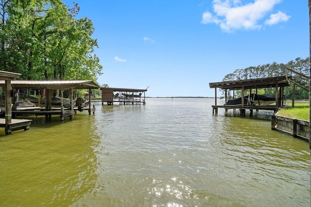 view of dock with a water view and boat lift