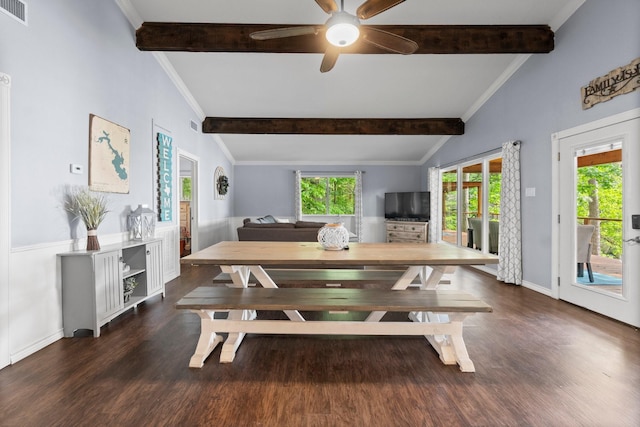 dining room with ceiling fan, lofted ceiling with beams, wood finished floors, and visible vents