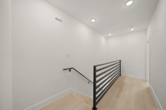 8131 Woodward St, Houston, TX 77051 - stairway with wood finished floors and recessed lighting