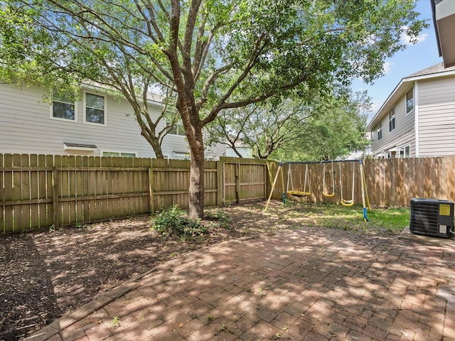 view of patio featuring a fenced backyard and central AC unit