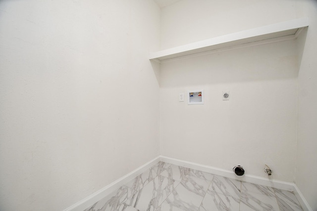 washroom with hookup for a washing machine, hookup for an electric dryer, marble finish floor, baseboards, and laundry area